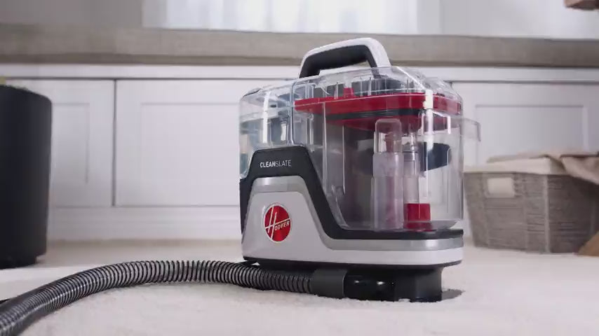 Load video: Hoover&#39;s best spot cleaner is shown cleaning multiple surfaces and multiple messes displaying its versatility, portability, extended battery life and quiet design. 