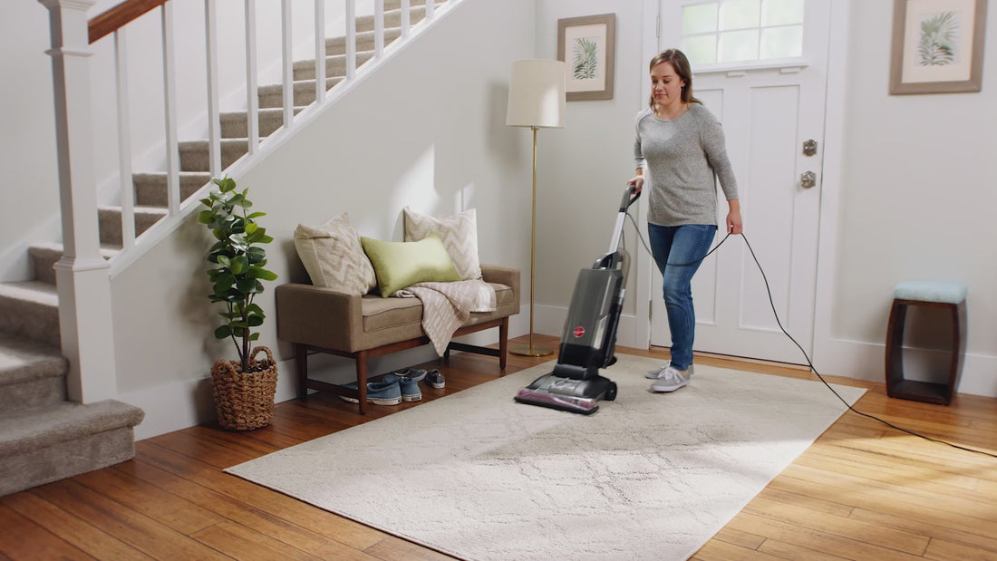 Person using the Hoover complete performance advanced bagged upright vacuum calling out it's Hoover's most powerful upright.  