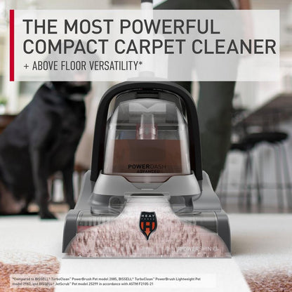 Close up of the powerdash pet advanced being used to clean a carpet highlighting its above floor versatility as the most powerful compact carpet cleaner