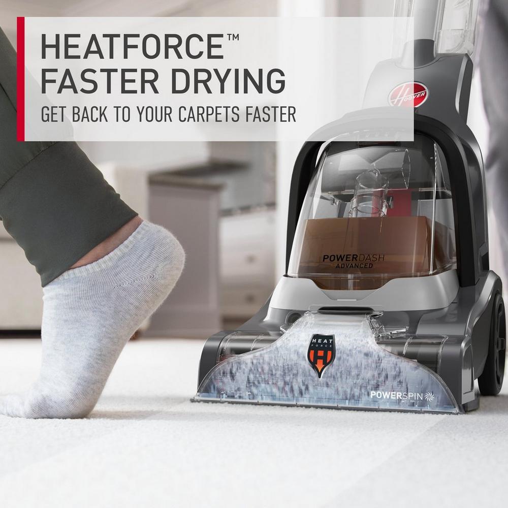 Someone is walking on carpet as its being cleaned with the powerdash pet advanced carpet cleaner, highlighting the heatforce technology, which allows for faster drying time. 